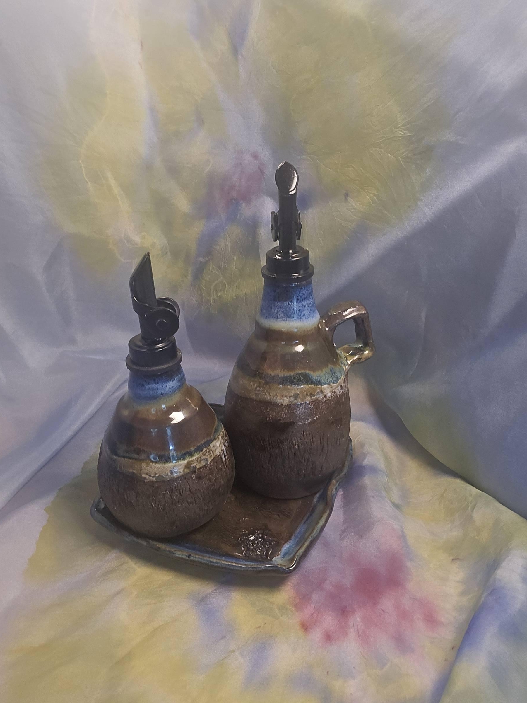 Handmade oil and vinegar tabletop set by Clay Therapy