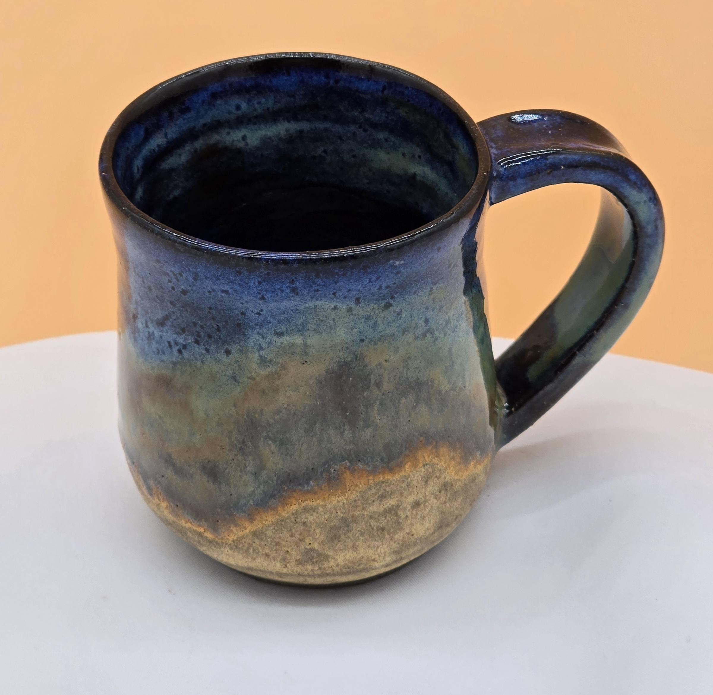 Handmade chocolate clay beach mug by Clay Therapy